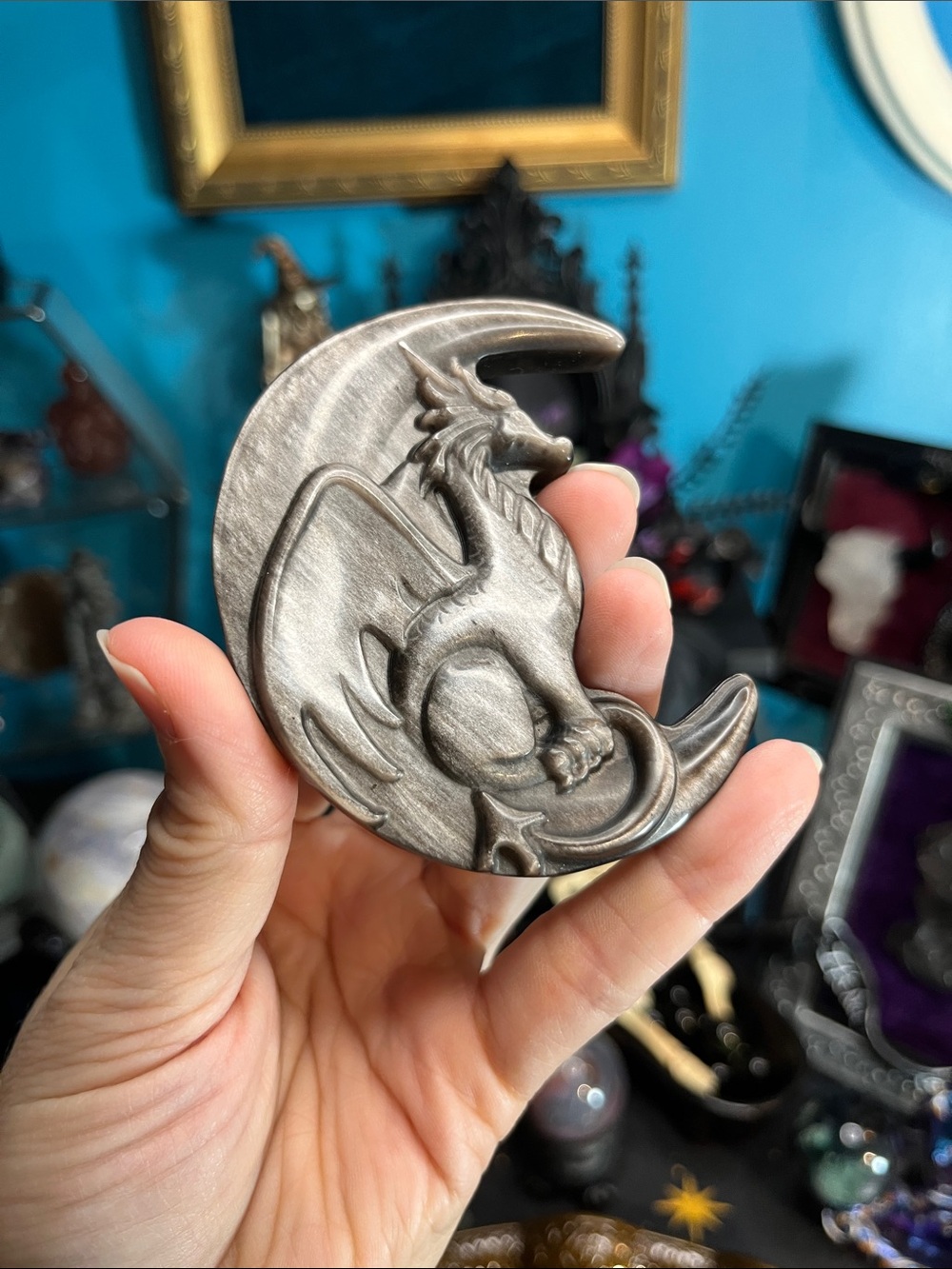 Silver obsidian dragon in moon